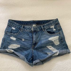 Distressed denim shorts